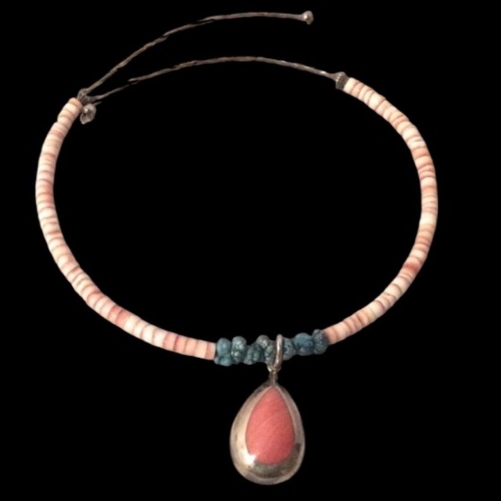 Sterling silver pendant on turquoise and Heishi bead necklace